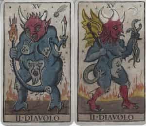 The Trionfi della Luna Devils/Il. Diavolo. The one that was inserted in the Majors Only is seen from the side, walking with snakes in his left hand and a club in the right. The alternative Devil is pictured from the front and holds his burning tail and a short sword. Both have faces on their body.